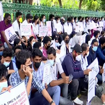 Indian medical students studying in China organize a staged protest in Kerala